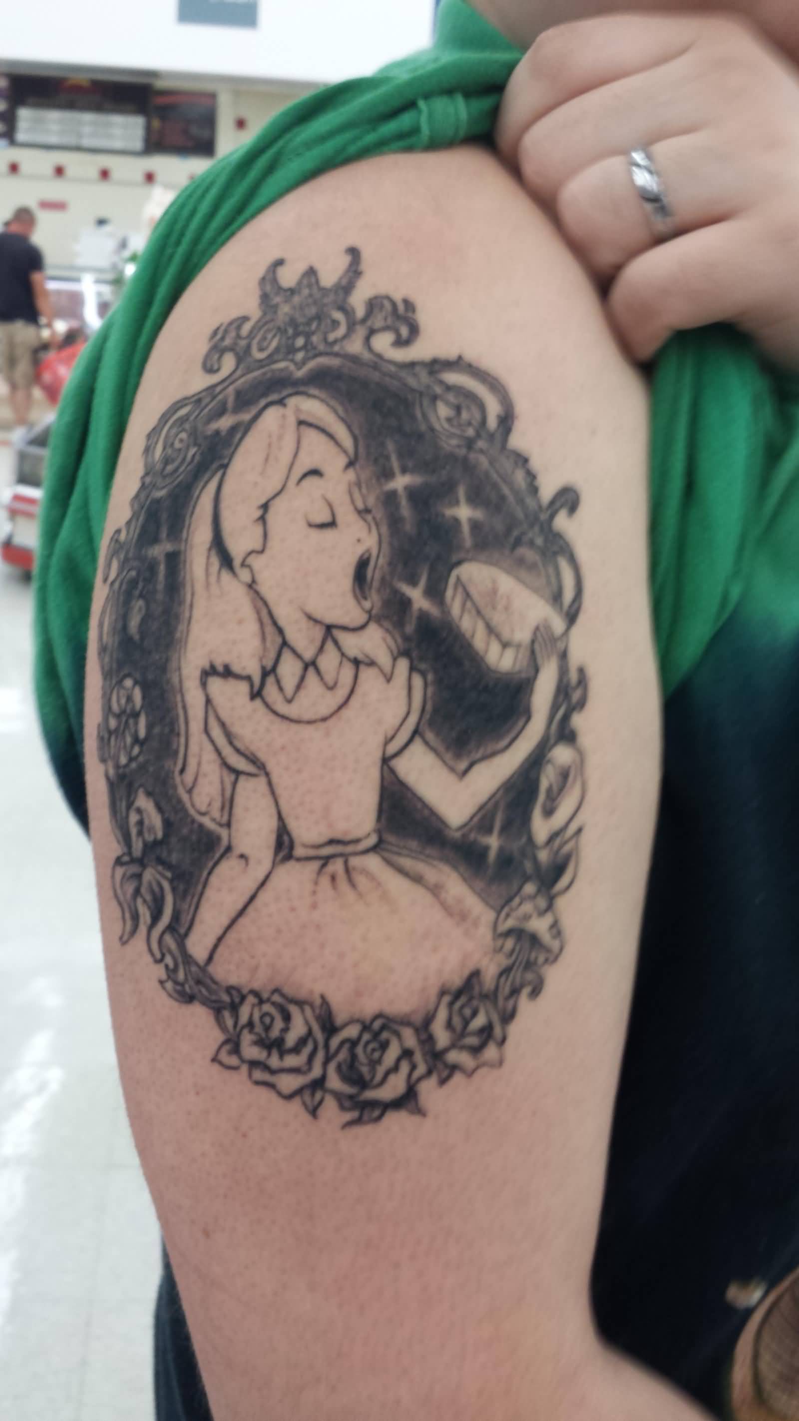 Black And Grey Alice in Wonderland Tattoo On Right Shoulder