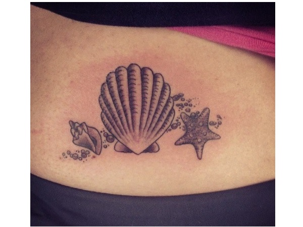 Black And Grey Starfish With Seashell And Conch Tattoo