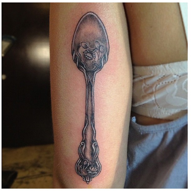 Black And Grey Vintage Spoon Tattoo On Triceps By Amy