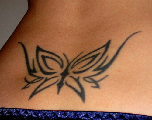 Black Ink Tribal Butterfly Tattoo On Hip For Girls