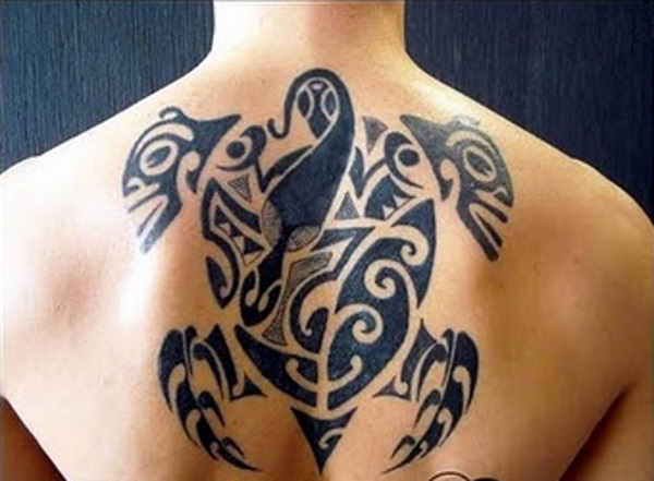 Black Ink Tribal Turtle Tattoo On Upper Back