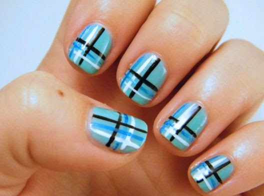 Blue Nails With Black And White Stripes Nail Art