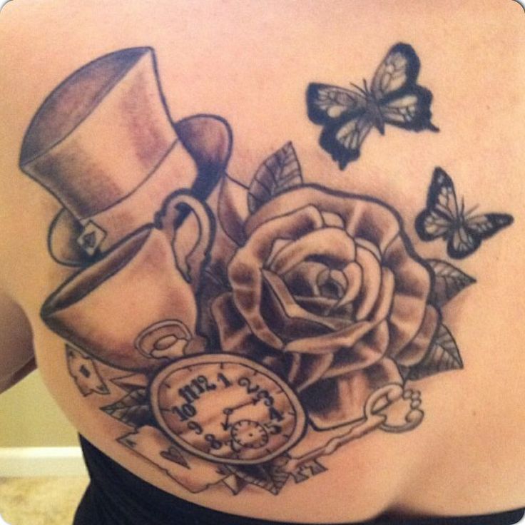 Butterflies And Alice in Wonderland Tattoo On Girl Back