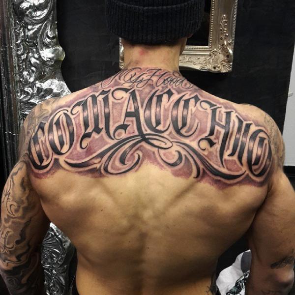 Chicano Tattoo On Man Upper Back