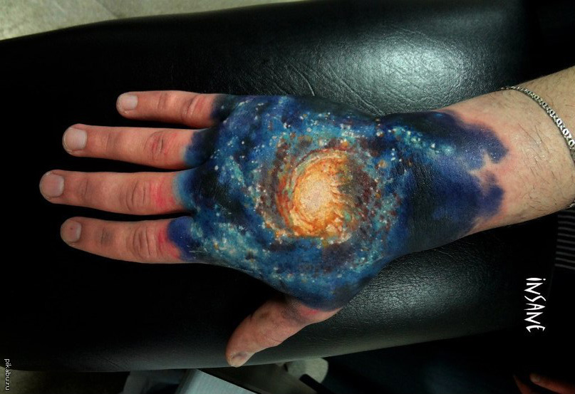 Color Ink Galaxy Tattoo On Right Hand