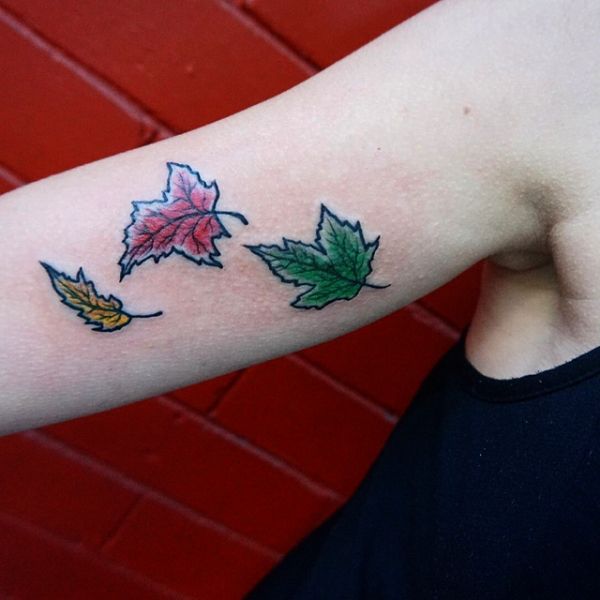 Colored Autumn Fall Leaves Tattoos On Bicep