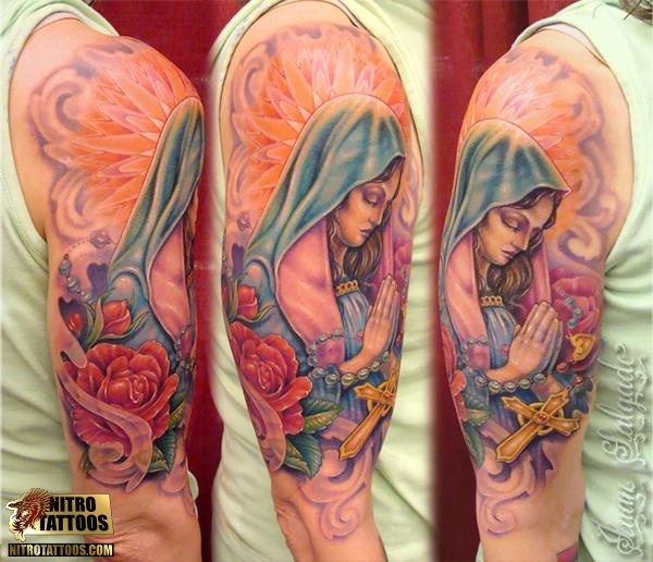 Colored Flowers And Praying Virgin Mary Catholic Tattoo On Half Sleeve