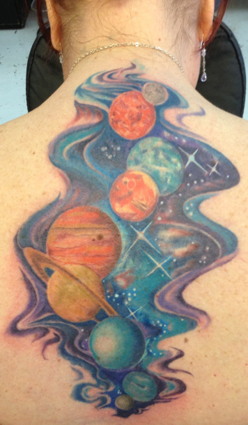 Colored Universe Tattoo On Girl Upper Back