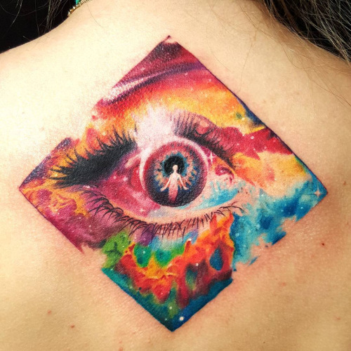 Colored Universe Tattoo On Upper Back