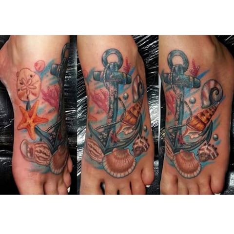 Colorful Anchor And Starfish In Water Tattoo On Foot