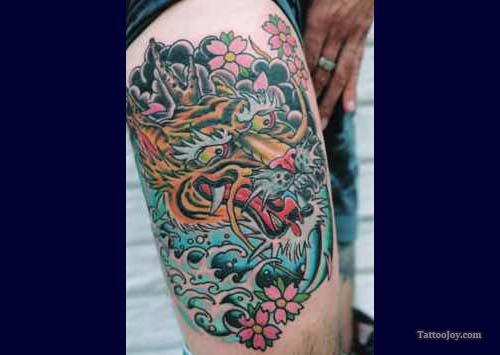 Colorful Chinese Foo Dog Tattoo On Thigh