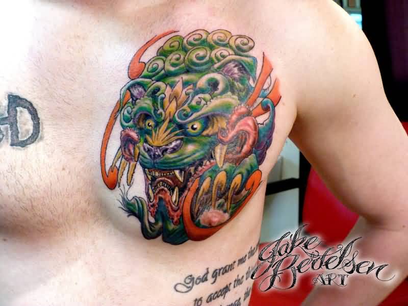 Colorful Foo Dog Head Tattoo On Chest