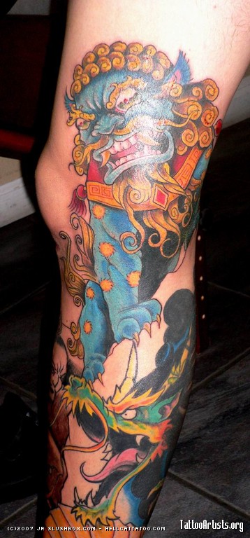 Colorful Foo Dog With Dragon Tattoo On Leg