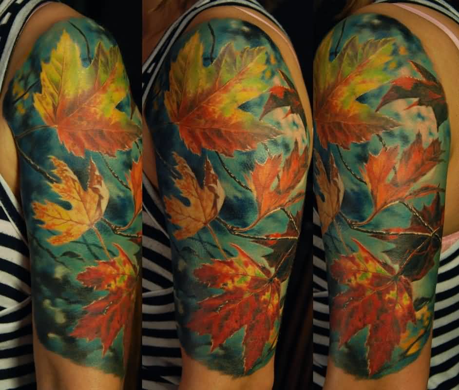 Colorful Maple Leaves With Blue Sky Fall Tattoo On Left Half Sleeve