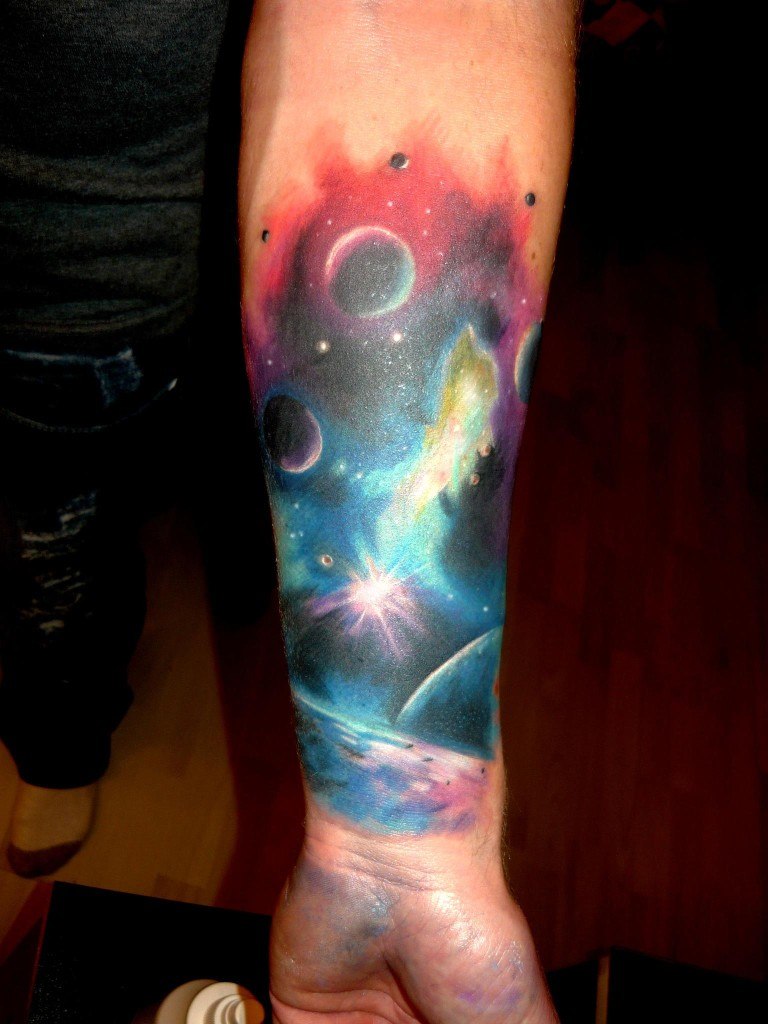 Colorful Universe Tattoo On Left Forearm