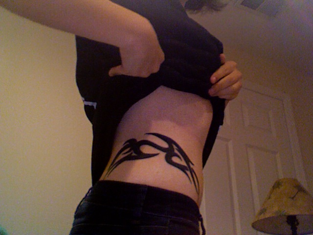 Cool Tribal Design Tattoo On Right Hip For Girls