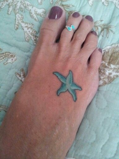 Cute Blue Starfish Tattoo On Foot