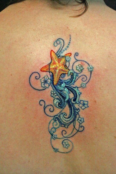 Cute Starfish With Designs Tattoo On Upper Back