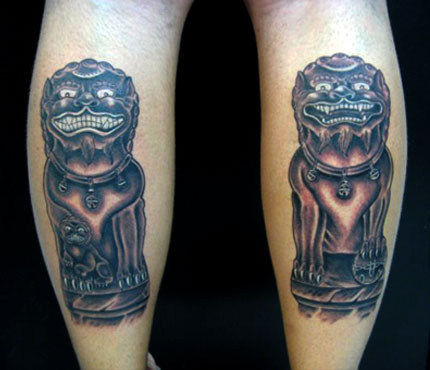 Dark Grey Foo Dog Statue Tattoos On Back Legs