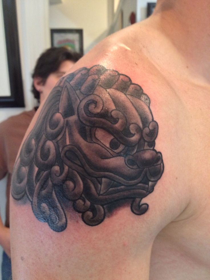 Dark Grey Ink Foo Dog Head Tattoo On Right Shoulder By Tegan Beyer