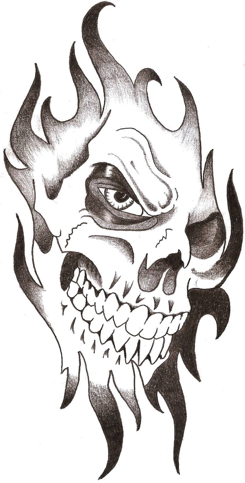 Different Skull In Tribal Design Tattoo Sample