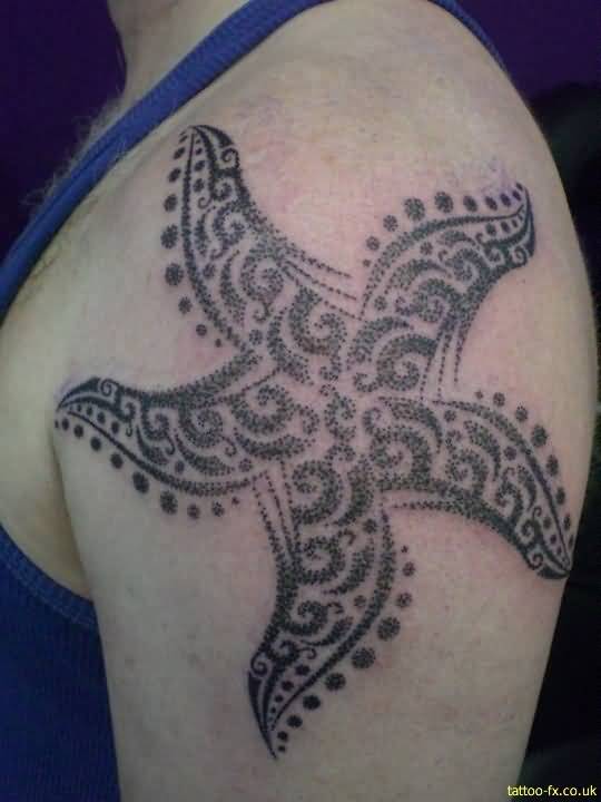 Dotwork Tribal Starfish Tattoo On Left Shoulder