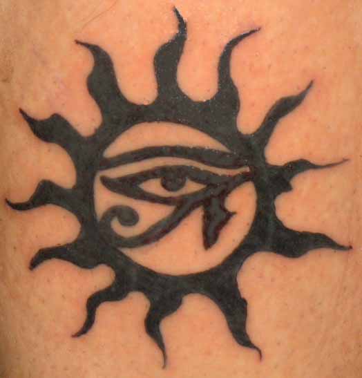 Egyptian Eye In Tribal Sun Tattoo