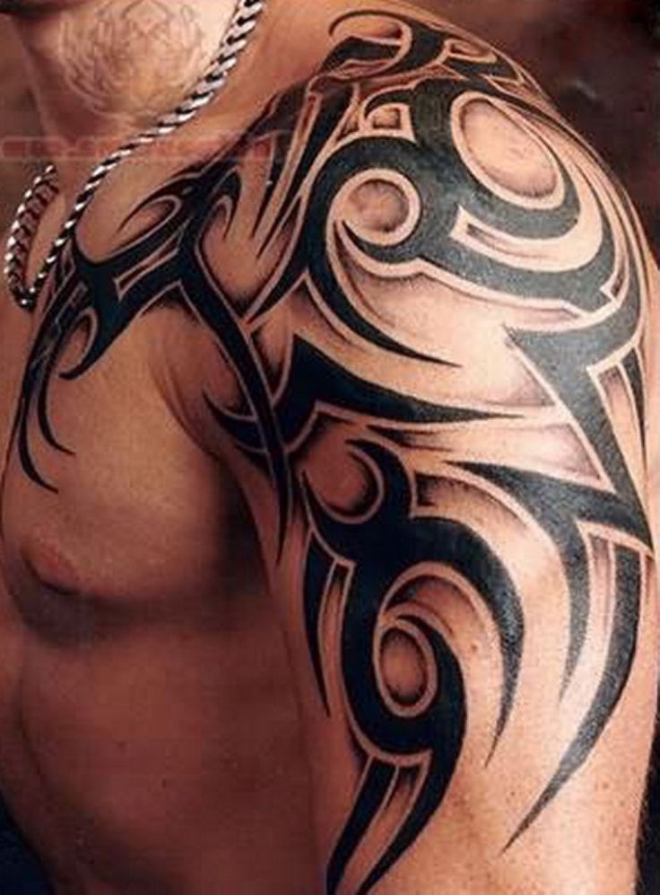 Fantastic Tribal Design Tattoo On Left Shoulder
