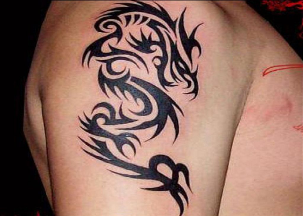 Fantastic Tribal Dragon Tattoo On Right Shoulder