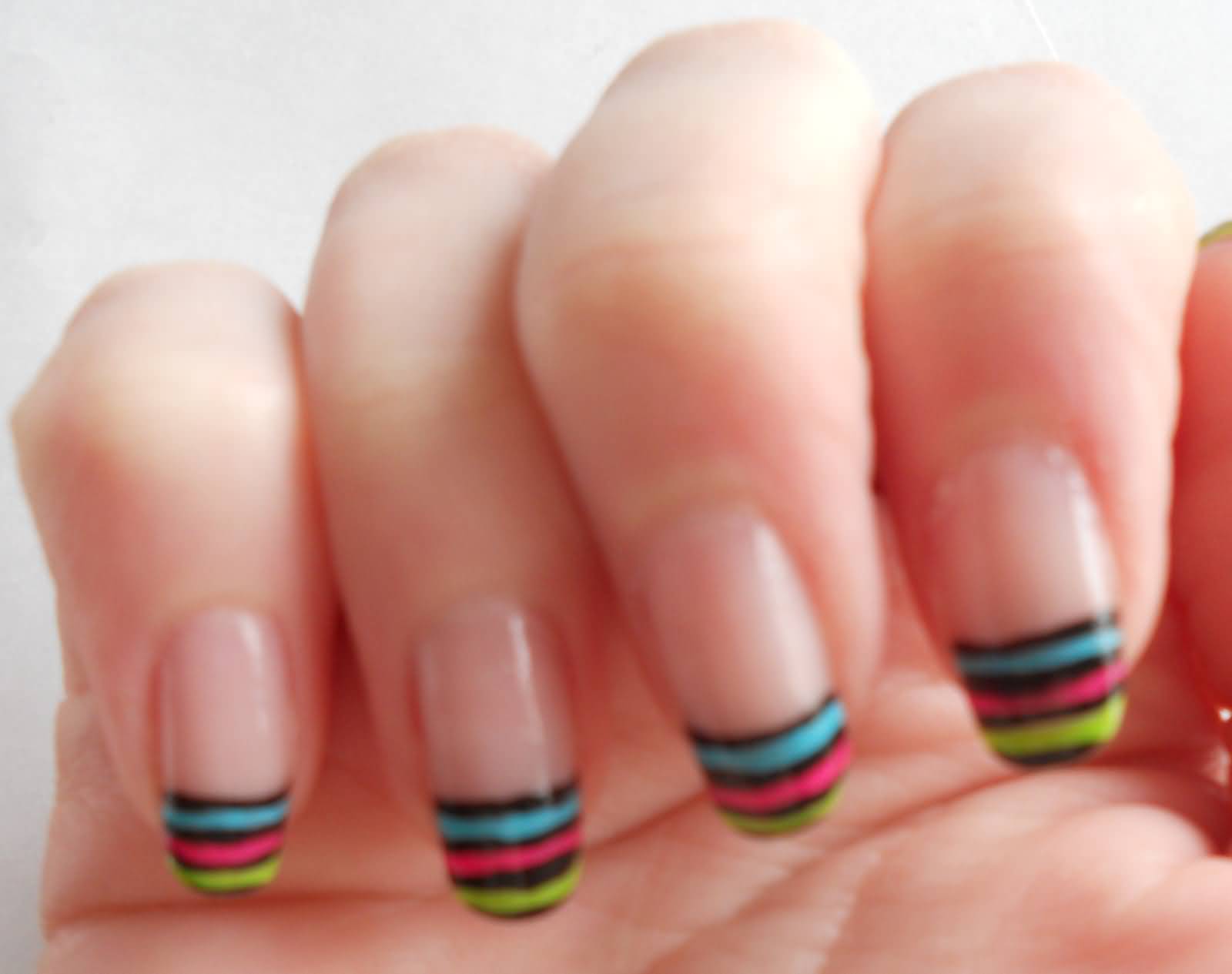 6. French Tip Gel Nails with Colorful Stripes - wide 6