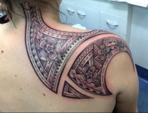 Grey Color Tribal Tattoo On Upper Shoulder To Neck