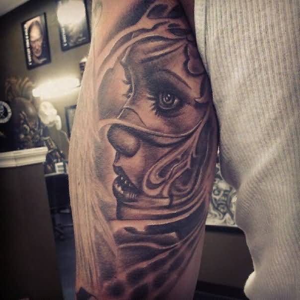 Grey Ink Chicano Tattoo On Bicep For Men