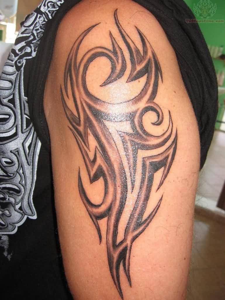 Grey Ink Tribal Design Tattoo On Left Half Sleeve