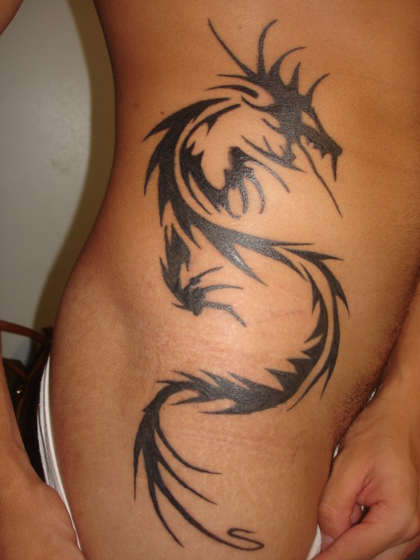 Impressive Tribal Dragon Tattoo On Side Rib