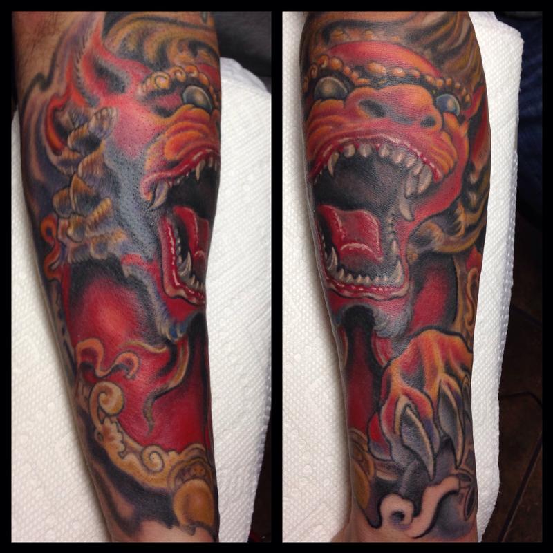 Incredible Angry Foo Dog Colorful Tattoo On Arm Sleeve