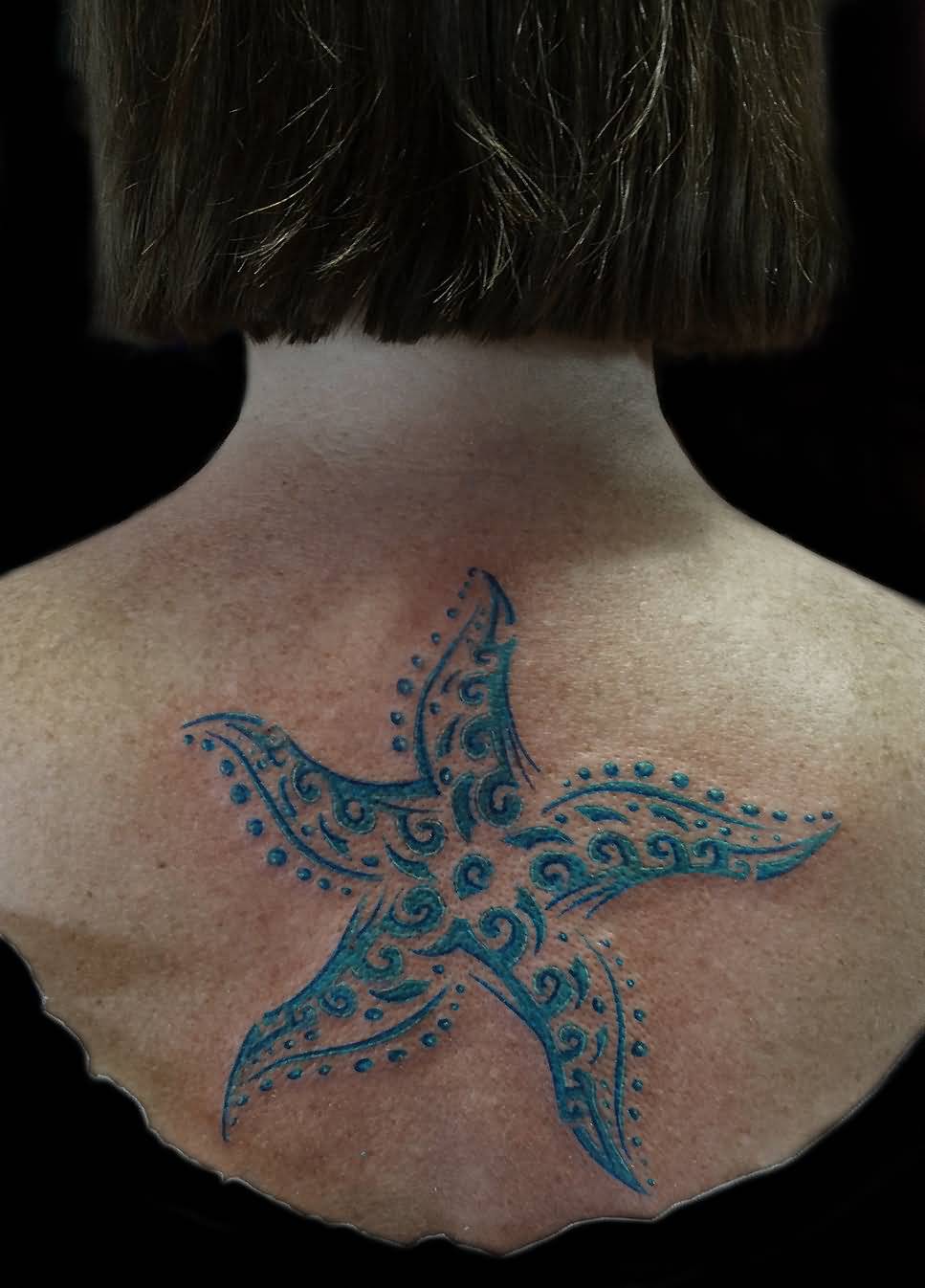 Large Blue Color Starfish Tattoo On Upper Back