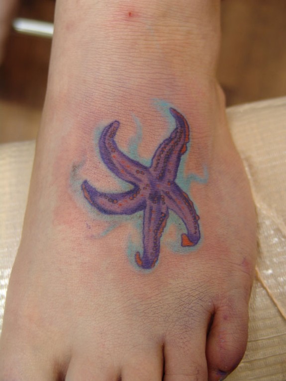 Lovely Starfish In Water Tattoo On Foot