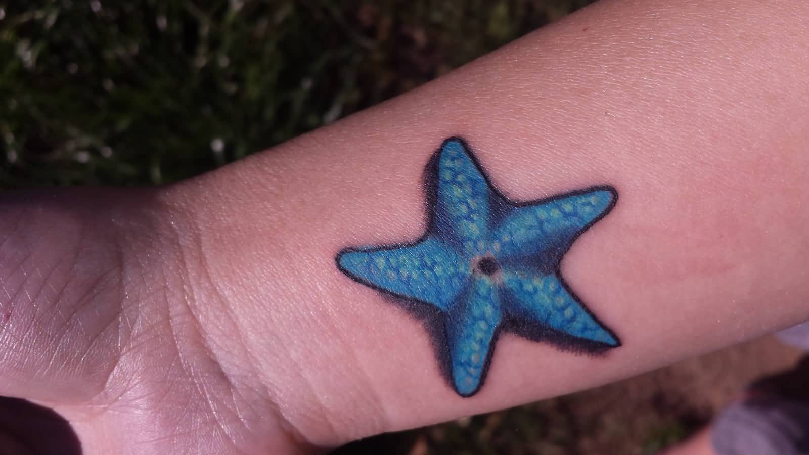 Nice 3D Blue Starfish Tattoo On Wrist By Jason Wayne