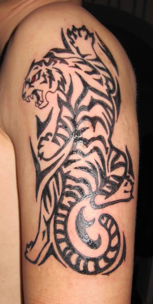 Nice Angry Tribal Tiger Having Red Eye Tattoo On Left Half Sleeve