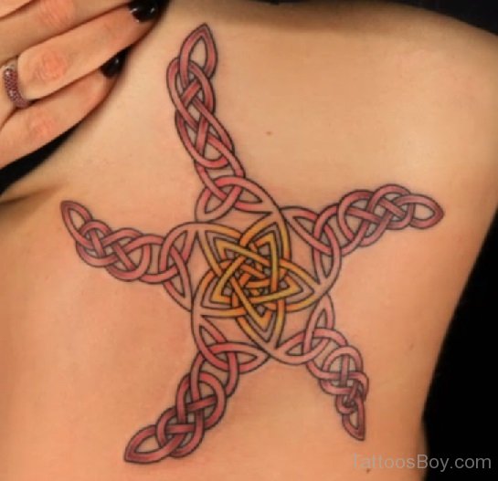 Nice Celtic Starfish Tattoo On Side Rib