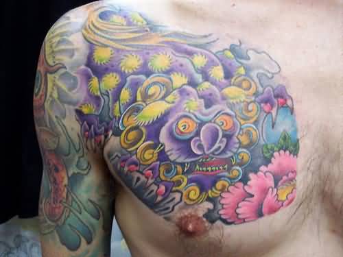Nice Colorful Foo Dog Tattoo On Chest To Shoulder