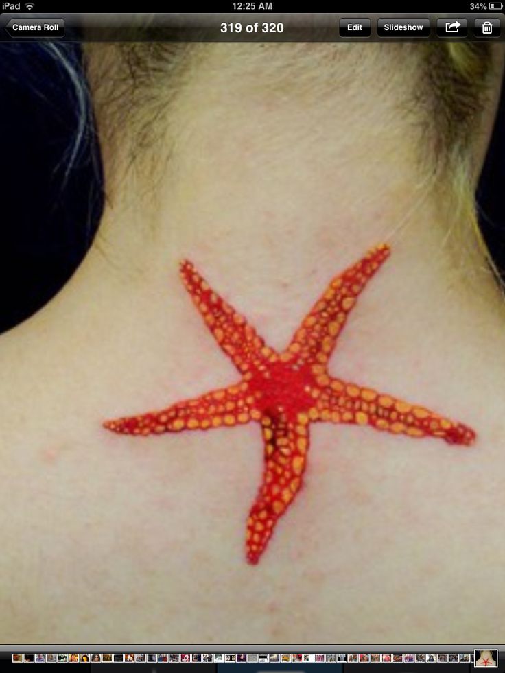 Nice Red Color Starfish Tattoo On Nape