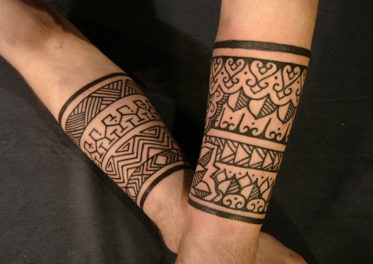 Nice Traditional Tribal Band Tattoo On Both Forearms
