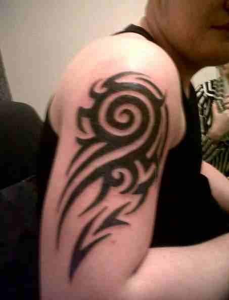 Nice Tribal Design Tattoo On Right Half Sleeve By MickeyDtattooist