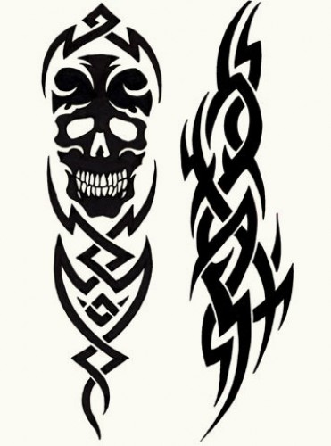 Nice Tribal Skull With Design Tattoo