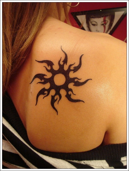 Nice Tribal Sun Tattoo On Right Back Shoulder For Girls