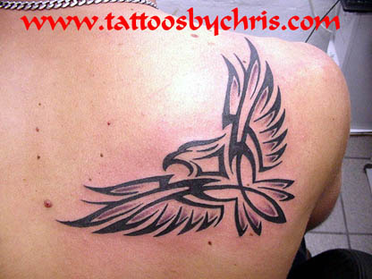 Outstanding Flying Tribal Bird Tattoo On Right Back Shoulder