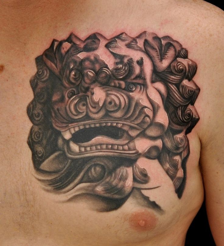 Outstanding Grey And Black Foo Dog Head Tattoo On Left Chest