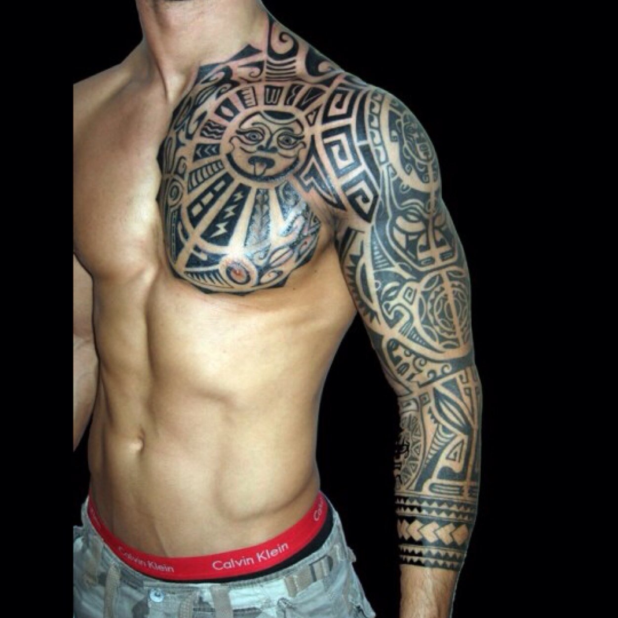 Outstanding Hawaiian Tribal Tattoo On Left Full Sleeve And Chest