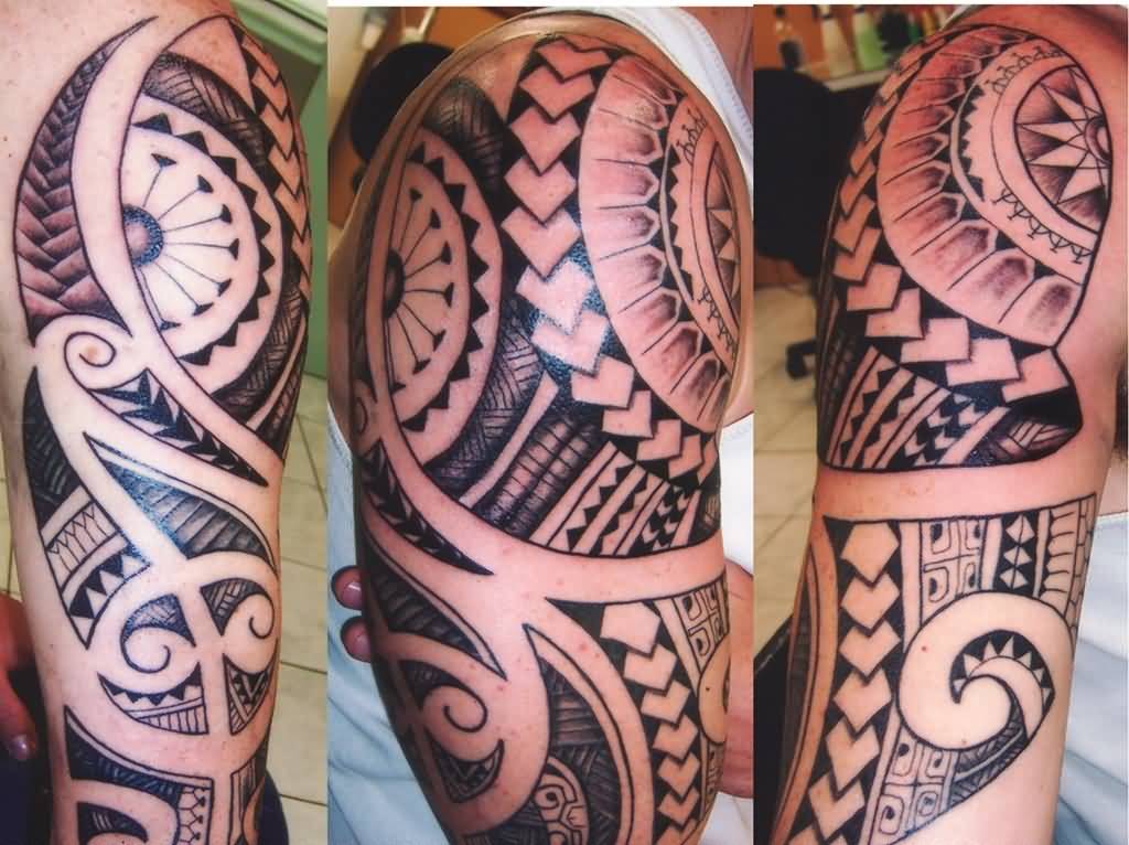 Outstanding Hawaiian Tribal Tattoo On Left Sleeve